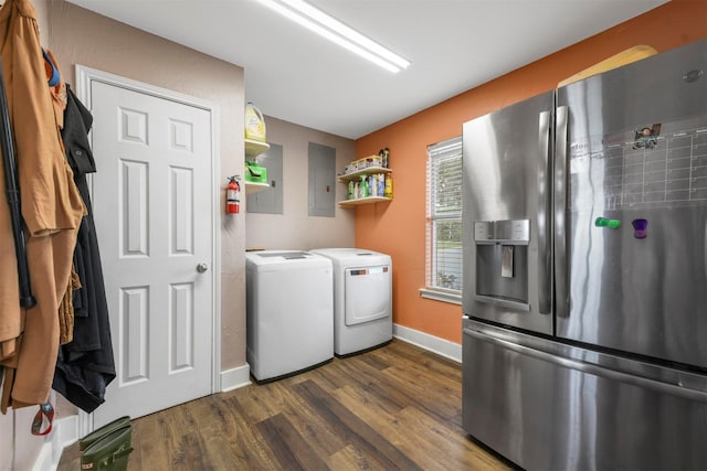 washroom with electric panel, dark hardwood / wood-style flooring, and independent washer and dryer