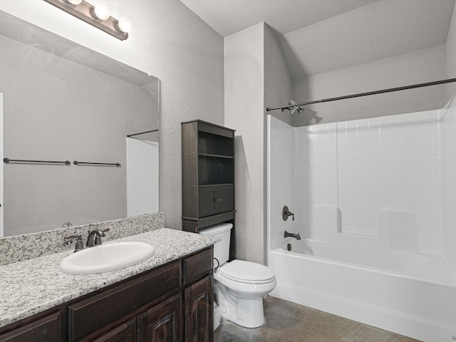 full bathroom featuring toilet, vanity, a textured ceiling, and bathing tub / shower combination