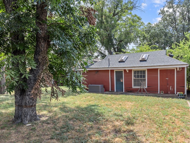 view of front of home with a front yard