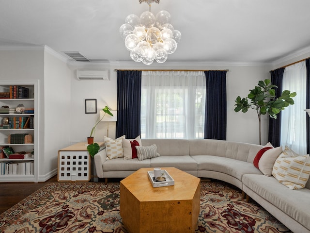 living room featuring ornamental molding, a chandelier, a wall mounted air conditioner, and dark hardwood / wood-style floors