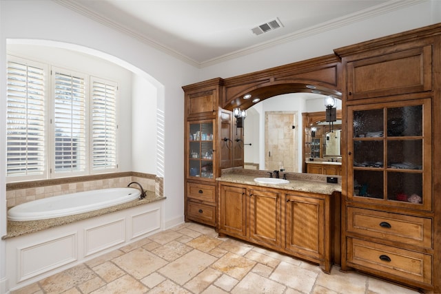 bathroom featuring plus walk in shower, crown molding, and vanity