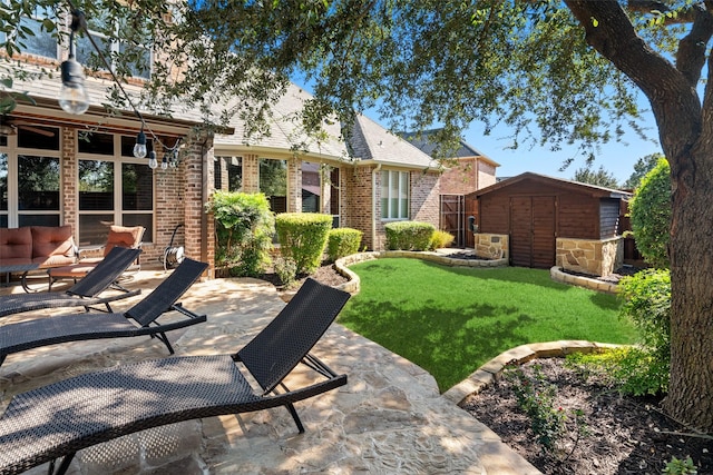 view of patio / terrace with an outdoor hangout area and a shed