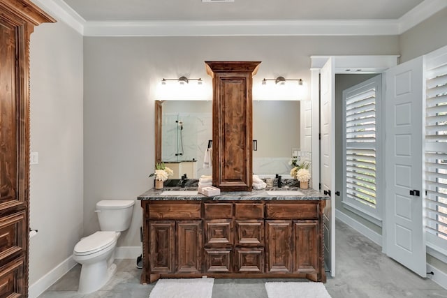 bathroom with ornate columns, vanity, toilet, and crown molding