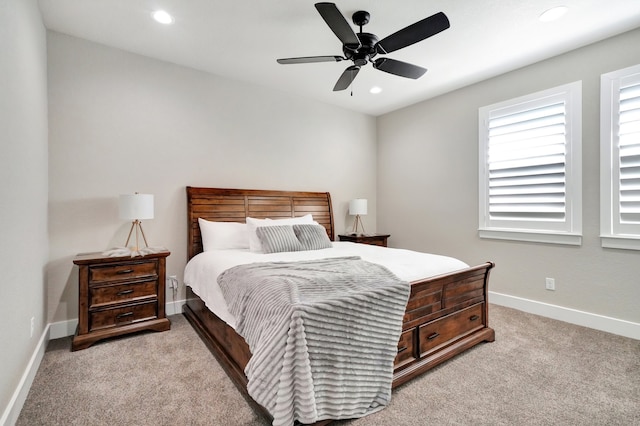 carpeted bedroom featuring ceiling fan