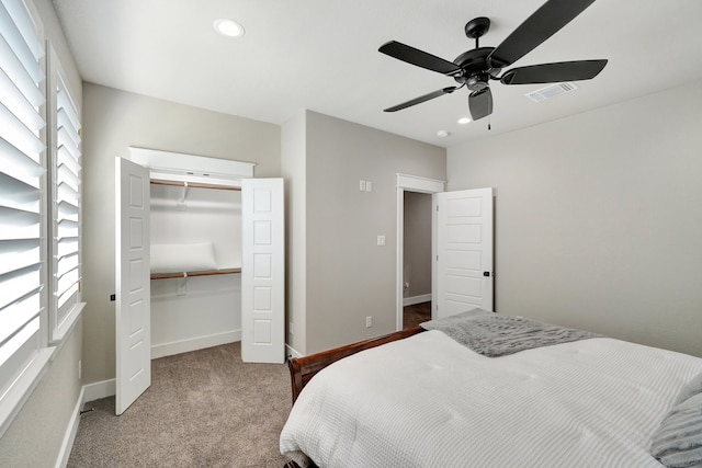 bedroom featuring a closet, ceiling fan, and carpet floors