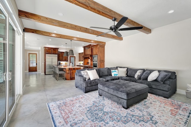 living room with sink, ceiling fan, and beam ceiling