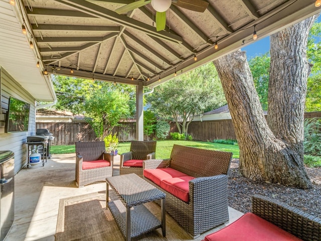 view of patio / terrace featuring ceiling fan, an outdoor hangout area, area for grilling, and a gazebo