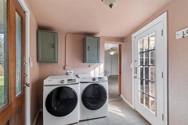 washroom with separate washer and dryer, ceiling fan, a textured ceiling, and light tile patterned floors