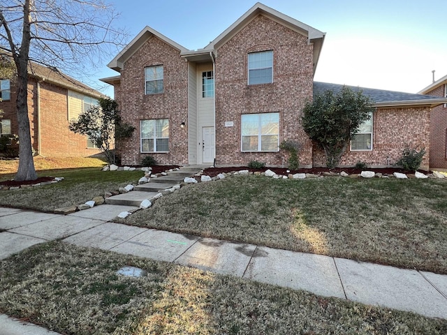 front of property featuring a front lawn