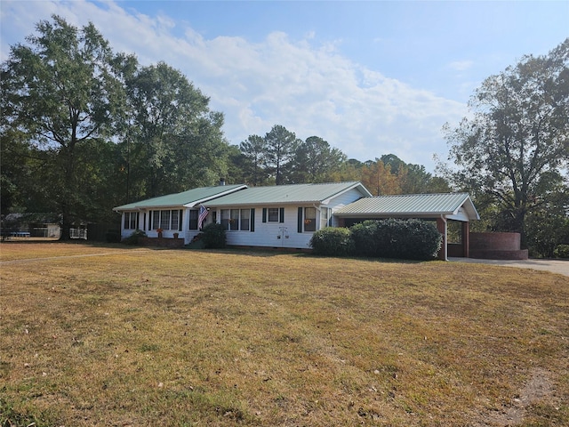 single story home with a carport and a front lawn