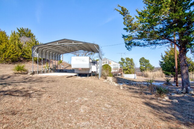 view of parking featuring a carport