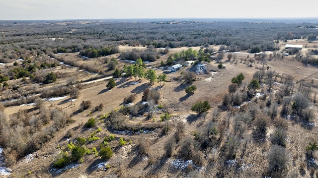 birds eye view of property featuring a rural view