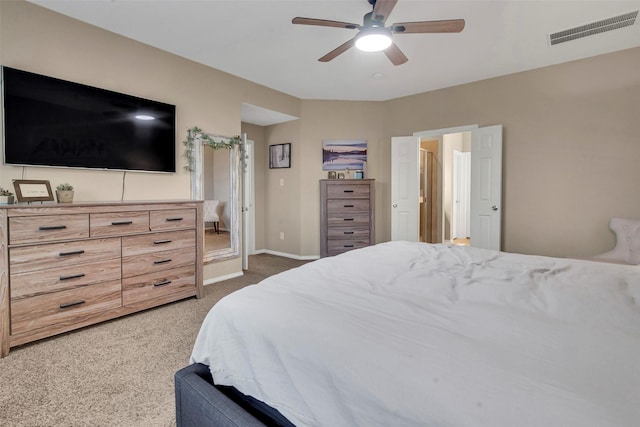 bedroom featuring dark carpet and ceiling fan