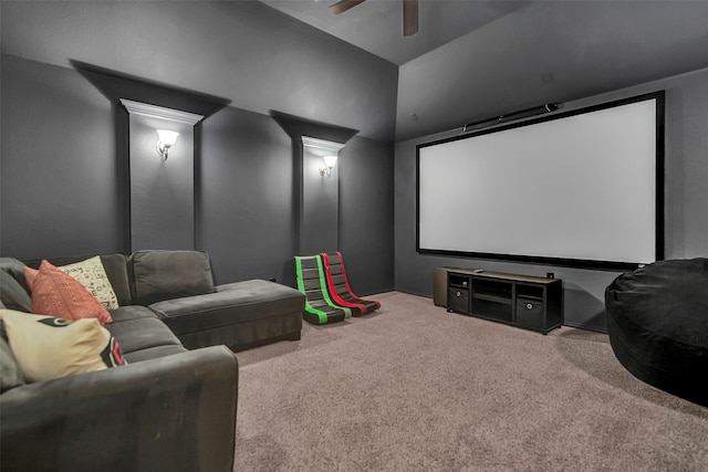 cinema featuring lofted ceiling, ceiling fan, and carpet flooring