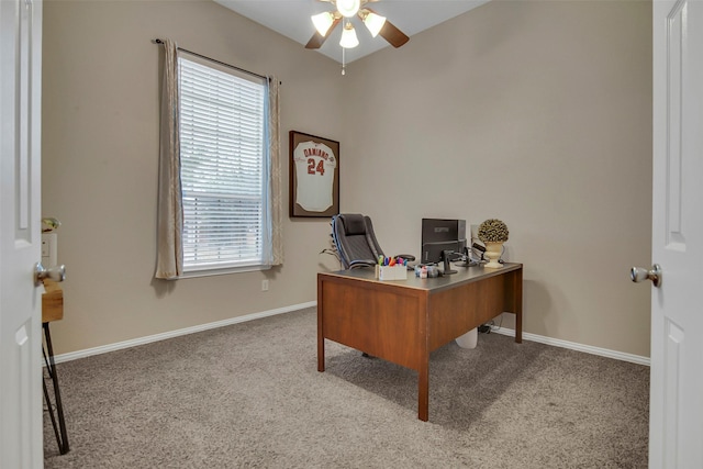 carpeted office featuring ceiling fan