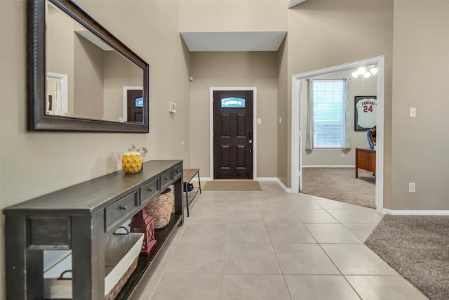 foyer featuring light tile patterned floors