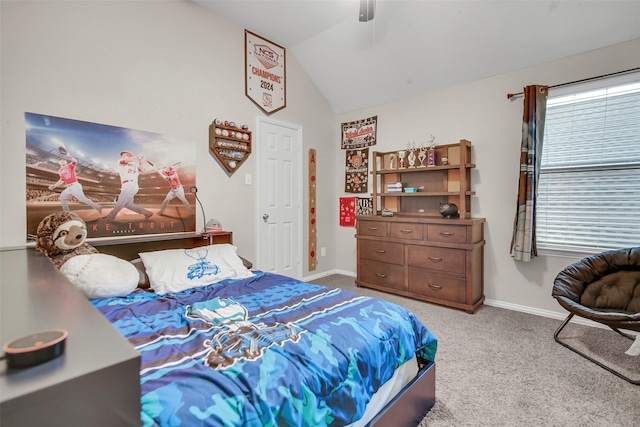 bedroom featuring light carpet, vaulted ceiling, and ceiling fan