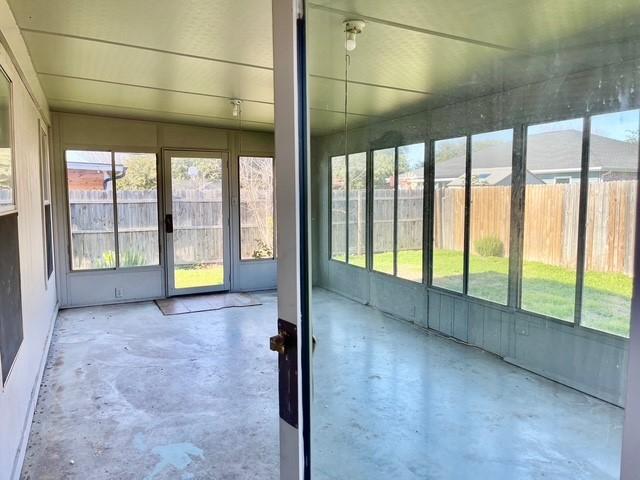 view of unfurnished sunroom