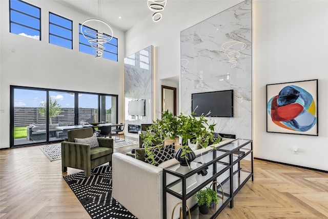 living area with a high ceiling