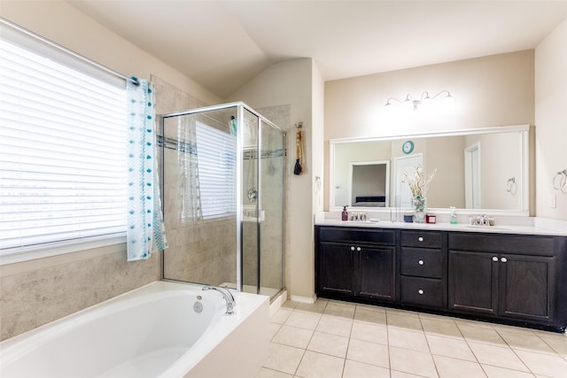 bathroom with lofted ceiling, vanity, tile patterned flooring, and shower with separate bathtub