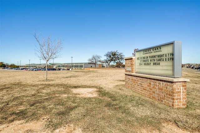 view of home's community featuring a yard