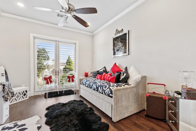 bedroom with ceiling fan, dark hardwood / wood-style flooring, french doors, and ornamental molding