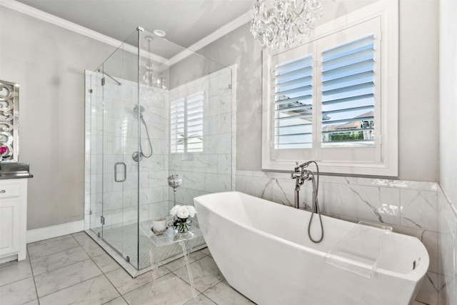 bathroom with vanity, separate shower and tub, an inviting chandelier, and crown molding