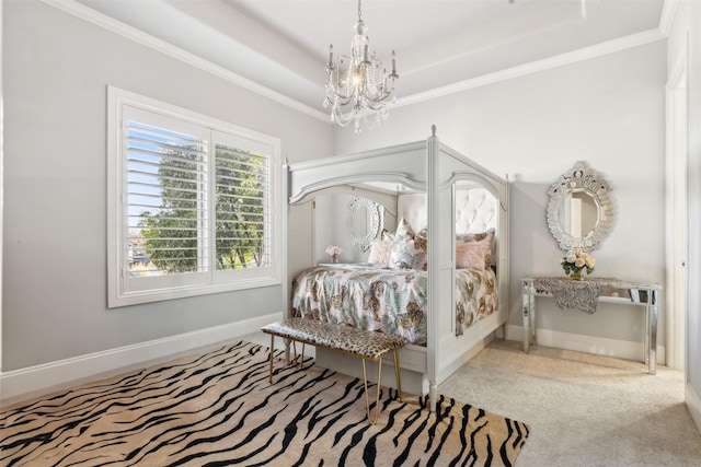 carpeted bedroom with a chandelier and ornamental molding