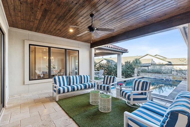 view of patio with a fenced in pool, ceiling fan, and an outdoor living space