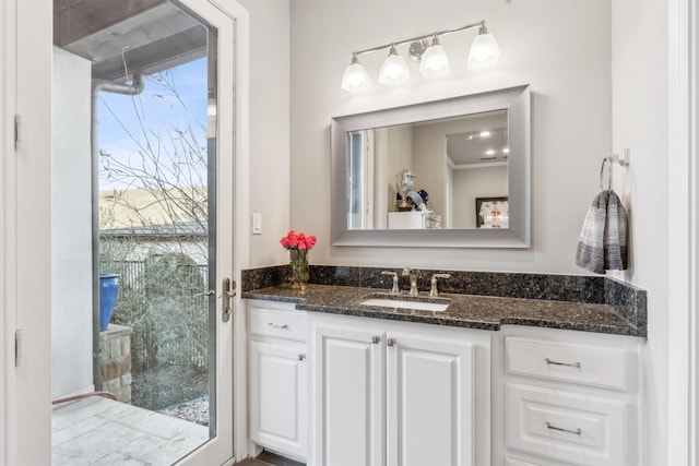 bathroom featuring vanity and a wealth of natural light