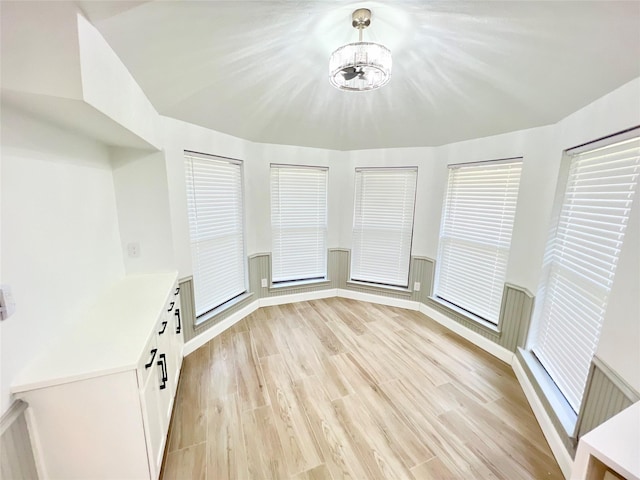 interior space featuring a chandelier