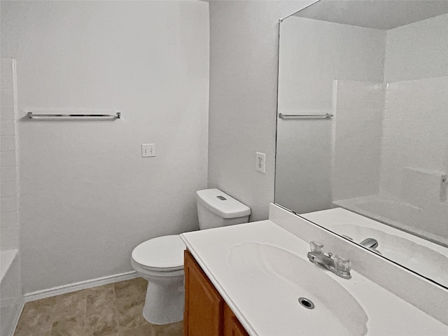 bathroom with toilet and vanity