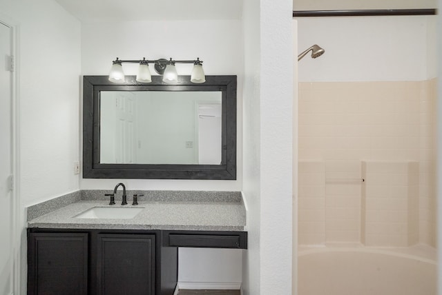 bathroom with  shower combination and vanity