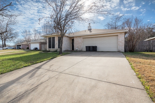 ranch-style house with a front yard and a garage