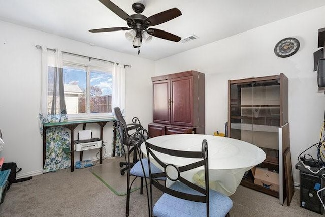 dining area with ceiling fan