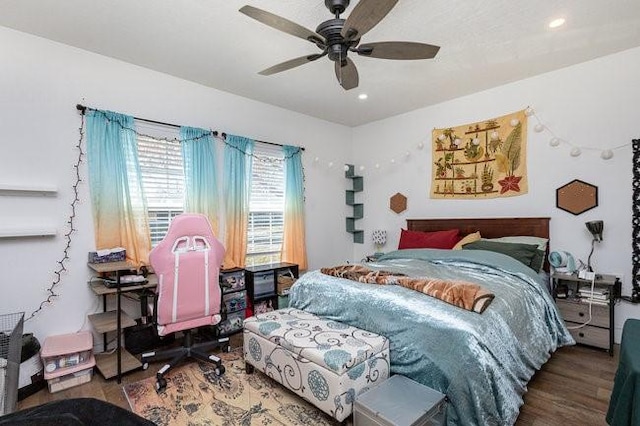 bedroom featuring hardwood / wood-style flooring and ceiling fan