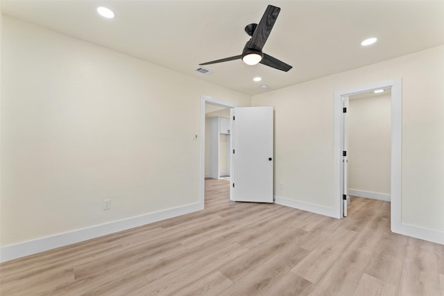 unfurnished bedroom with light hardwood / wood-style floors and ceiling fan