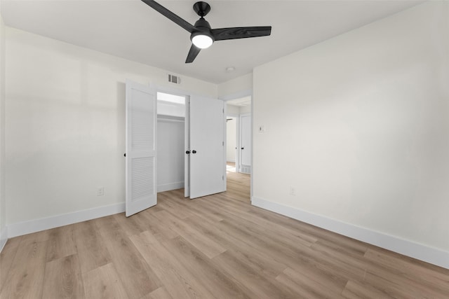 unfurnished bedroom featuring a closet, ceiling fan, and light hardwood / wood-style flooring