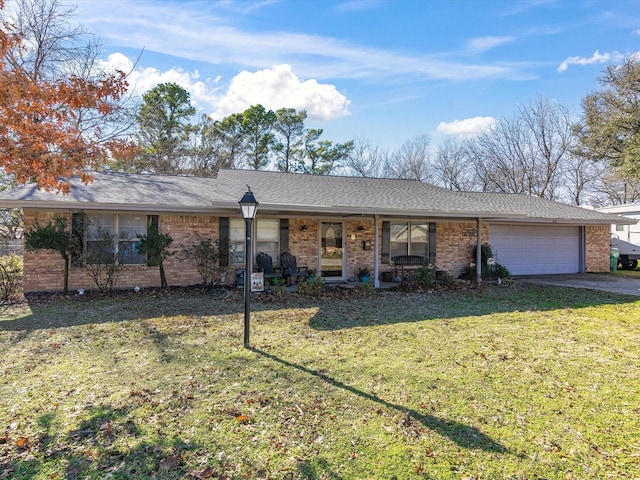 ranch-style house with a garage, covered porch, and a front lawn