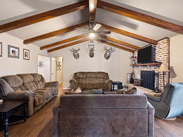 living room with a fireplace, lofted ceiling with beams, ceiling fan, and dark hardwood / wood-style floors