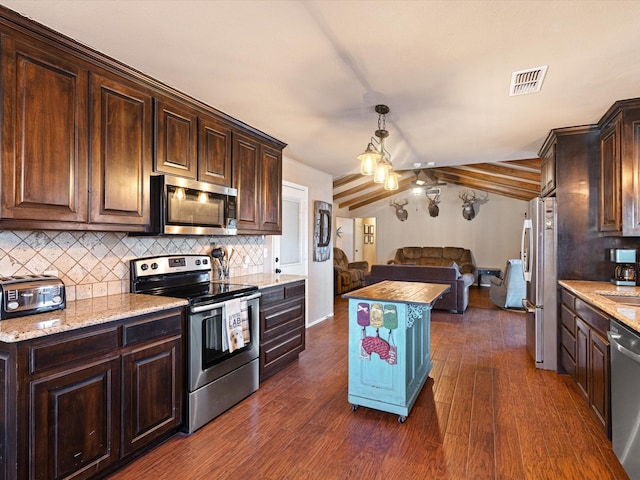 kitchen with appliances with stainless steel finishes, dark hardwood / wood-style floors, and dark brown cabinetry