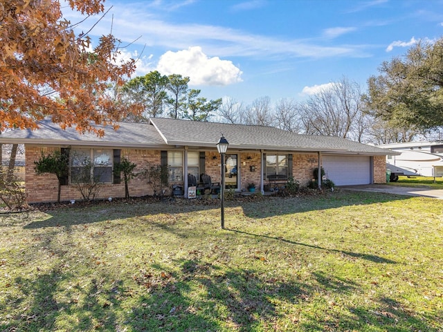 single story home with a front lawn and a garage