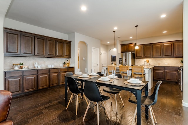 dining room featuring dark hardwood / wood-style flooring