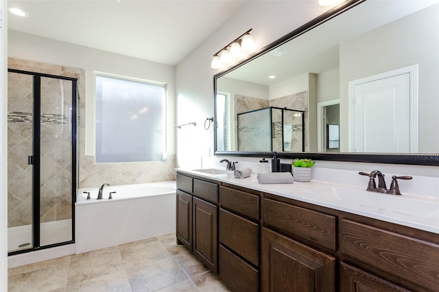 bathroom with separate shower and tub and vanity