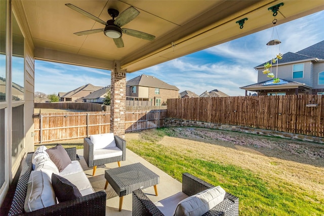 view of patio / terrace with ceiling fan and outdoor lounge area