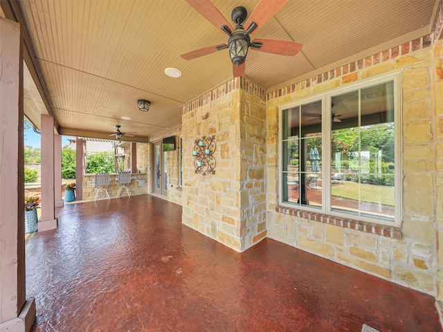 view of patio with ceiling fan