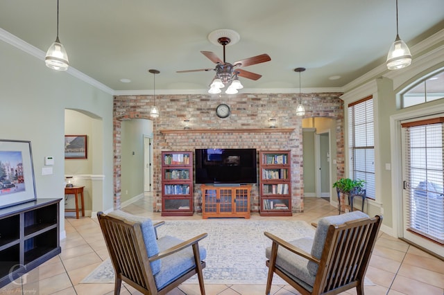 living room with brick wall, ornamental molding, and light tile patterned floors