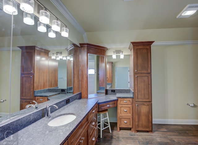 2104 Ashley Wilkes Dr, Bossier City, LA 71112 - bathroom featuring baseboards, ornamental molding, vanity, and wood finished floors