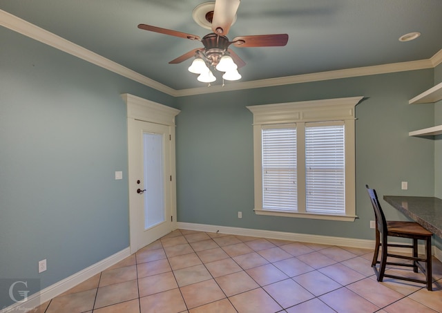2104 Ashley Wilkes Dr, Bossier City, LA 71112 - unfurnished dining area featuring light tile patterned floors, baseboards, ceiling fan, and crown molding
