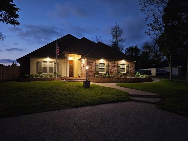2104 Ashley Wilkes Dr, Bossier City, LA 71112 - view of front of home with fence and a front yard